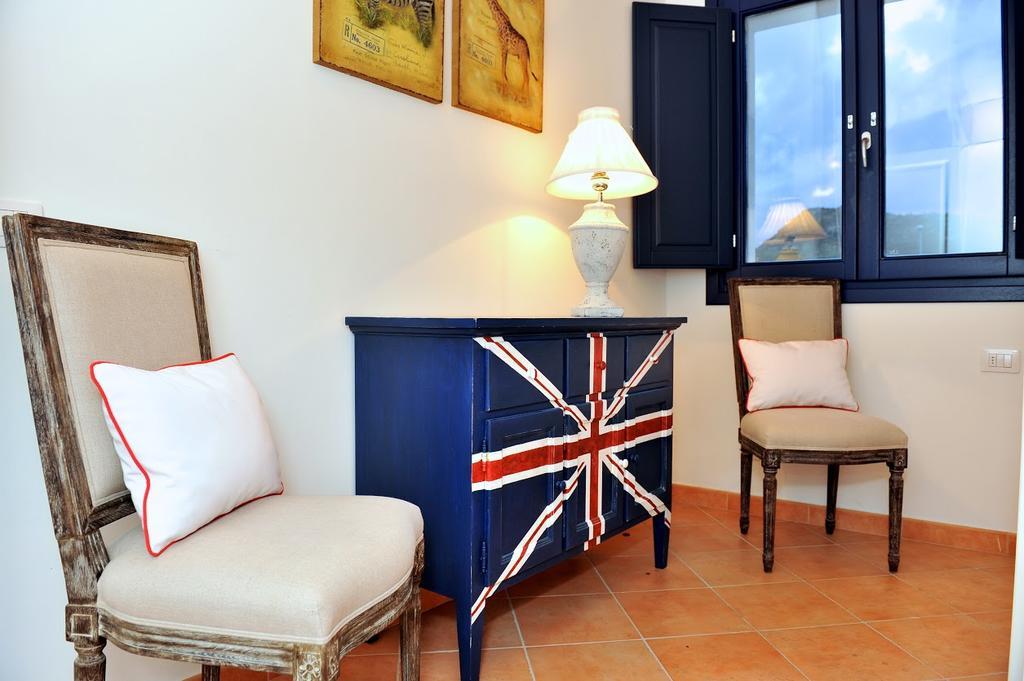 Appartamento Li Casi Bianchi San Teodoro  Camera foto